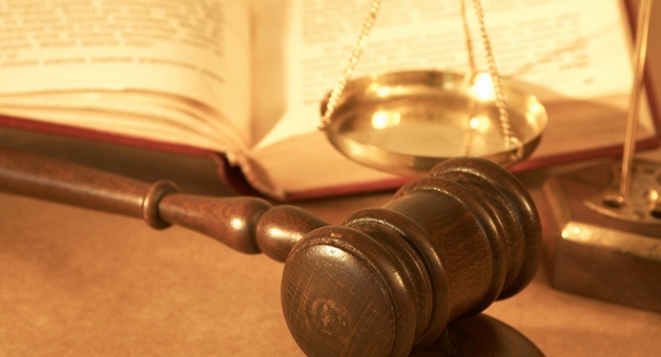 Judge under fire for blocking gay marriages and hanging Hitler portraits.